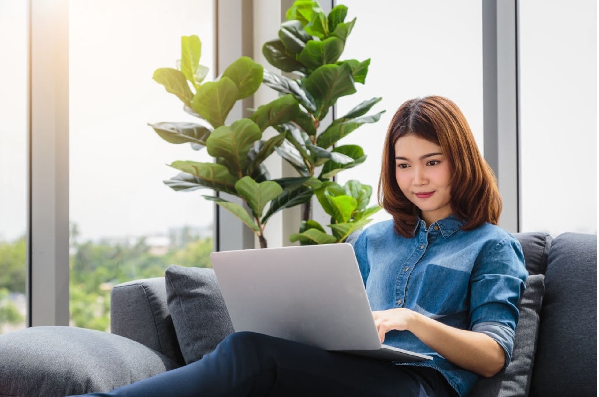 businesswoman working in sofa